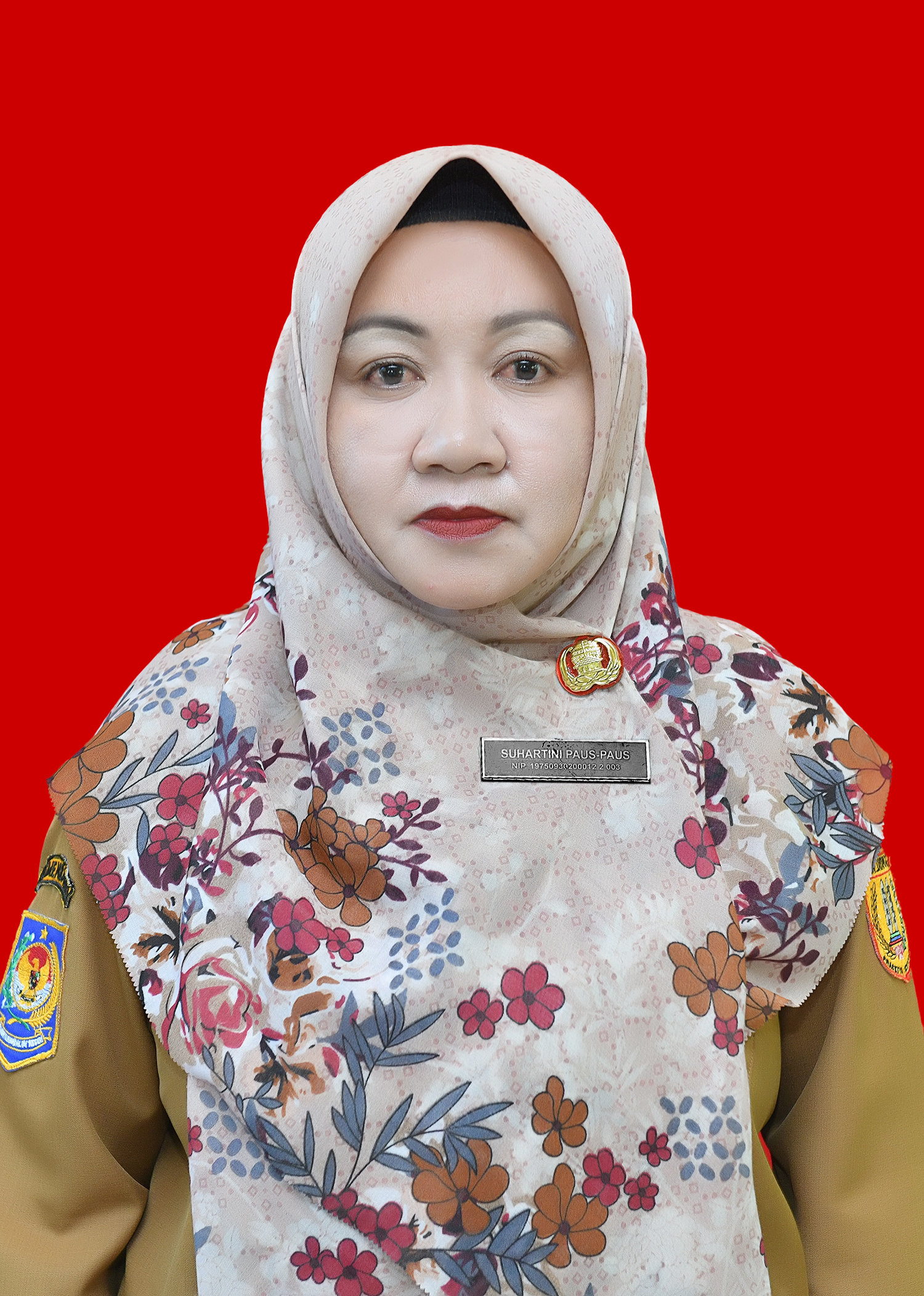 Suhartini Paus Paus, S.Pd.I
